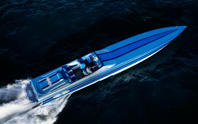 A popular activity for beginners is boating, such as an aerial view of a blue and white speed boat.